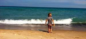 my son exploring the beach