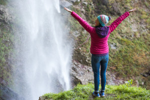 excited-woman-waterfall